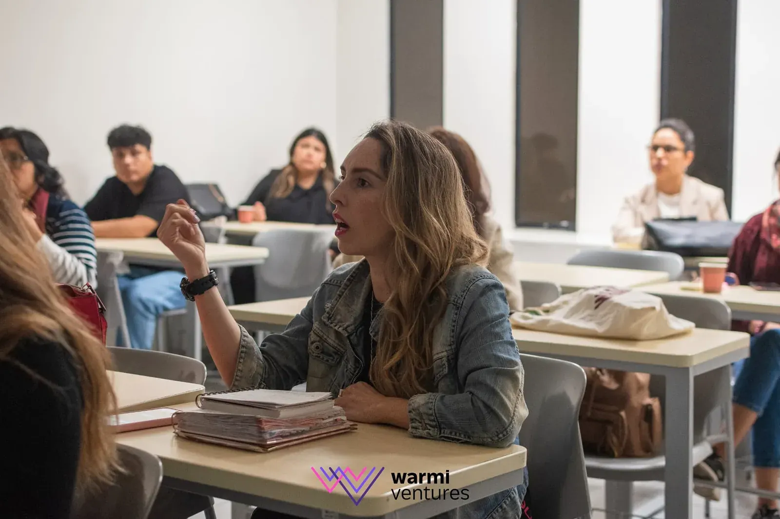Participante en sesión de aprendizaje práctico de Warmi Ventures